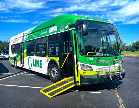 photo of a green and white RIPTA NFI XH40
