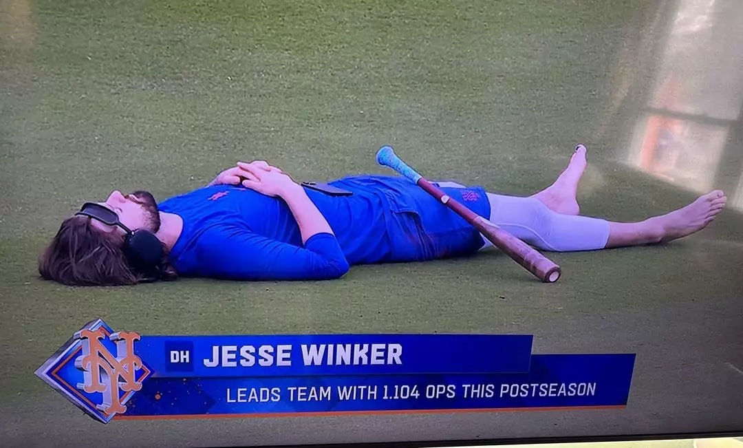 jesse winker laying on ground