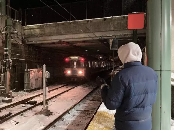 A picture of me waving to the incoming blue line